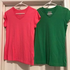two v-neck shirts